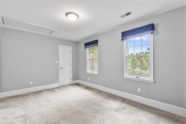 6 Yardarm Ct, Greensboro, NC 27455 - spare room with attic access, carpet, and baseboards