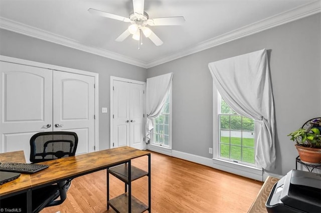 6 Yardarm Ct, Greensboro, NC 27455 - office area with light wood-style floors, crown molding, ceiling fan, and baseboards