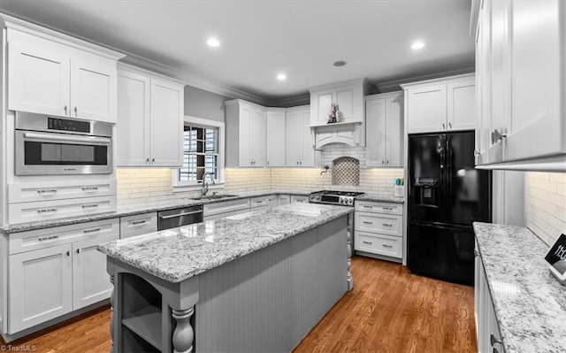 6 Yardarm Ct, Greensboro, NC 27455 - kitchen featuring stainless steel appliances, white cabinets, open shelves, decorative backsplash, and a sink