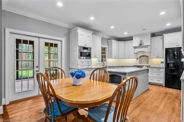 6 Yardarm Ct, Greensboro, NC 27455 - dining space featuring ornamental molding, light wood-style flooring, recessed lighting, and french doors