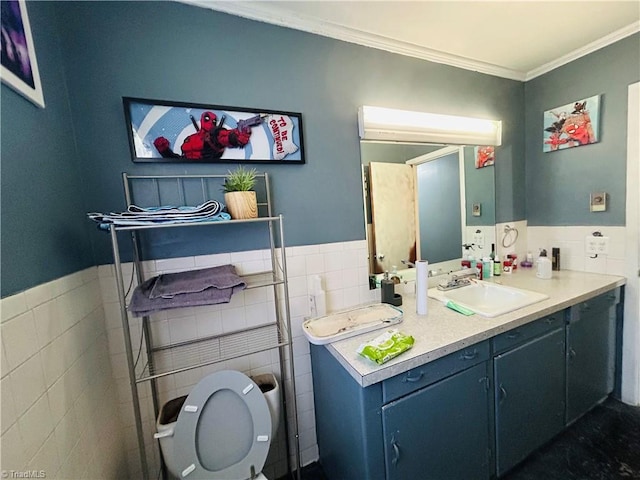 925 S Franklin Rd, Mount Airy, NC 27030 - bathroom with ornamental molding, tile walls, and a wainscoted wall