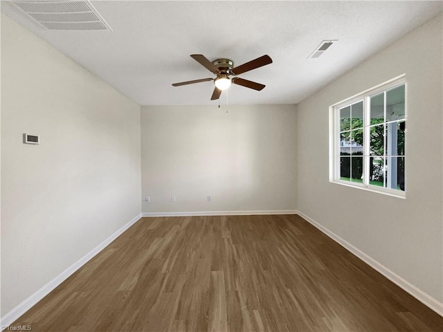 unfurnished room featuring wood-type flooring and ceiling fan