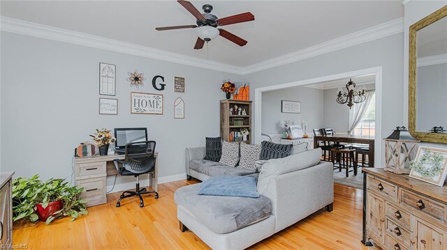 living room with light hardwood / wood-style floors, ceiling fan with notable chandelier, and ornamental molding