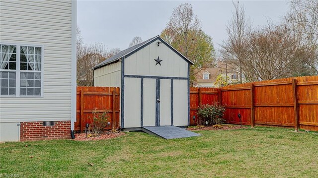 view of outdoor structure with a lawn