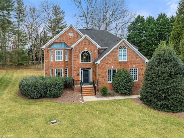 front facade with a front lawn