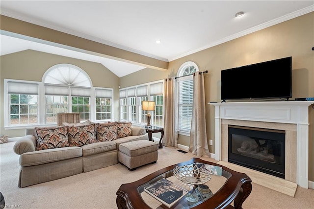 carpeted living room with a premium fireplace, vaulted ceiling, and ornamental molding