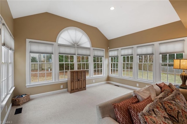 sunroom / solarium with lofted ceiling