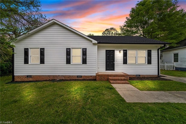 1117 Highland Ave, Greensboro, NC 27403 - view of front facade featuring crawl space and a front lawn