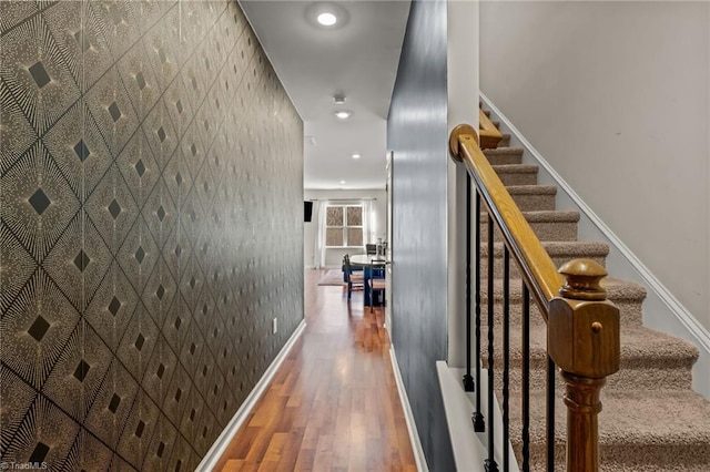 staircase featuring hardwood / wood-style flooring