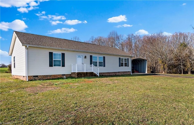 ranch-style house with a carport and a front lawn