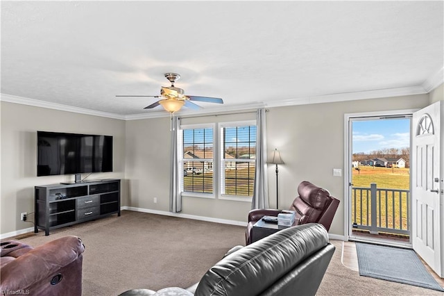 living room with light colored carpet, ceiling fan, and crown molding