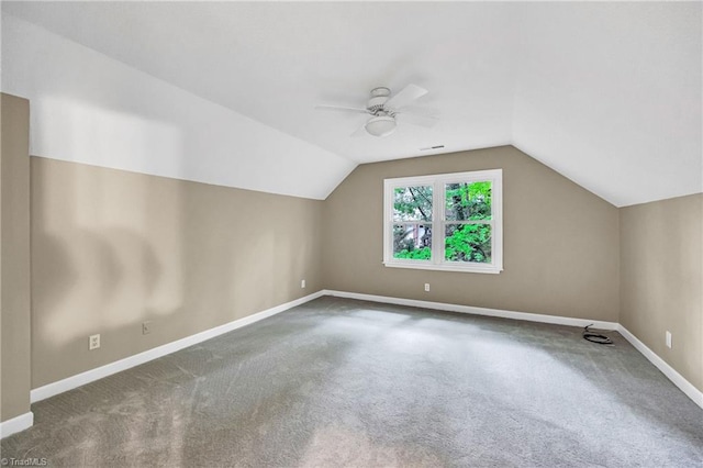 bonus room with baseboards, a ceiling fan, carpet flooring, and lofted ceiling