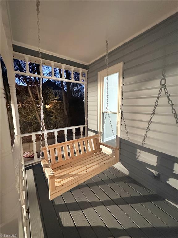 wooden deck featuring a porch