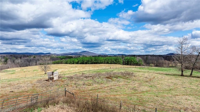 mountain view featuring a rural view