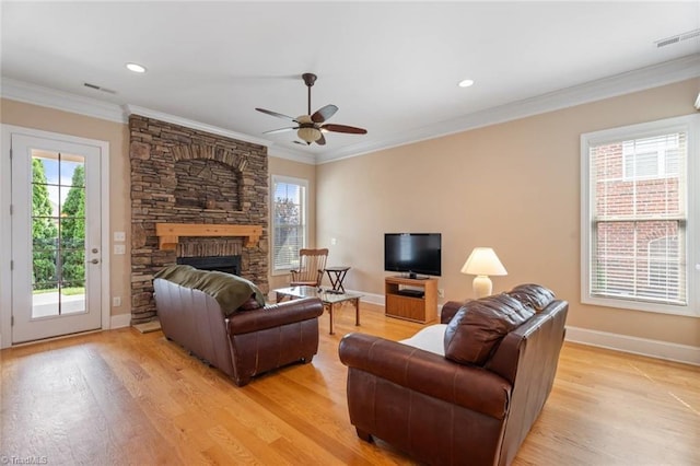 5584 Foxgate Cir, Winston-Salem, NC 27106 - living area with light wood-type flooring, baseboards, crown molding, a fireplace, and recessed lighting