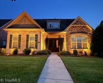 5584 Foxgate Cir, Winston-Salem, NC 27106 - view of front of property featuring a front yard