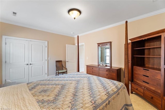 5584 Foxgate Cir, Winston-Salem, NC 27106 - bedroom with ornamental molding, a closet, and light carpet