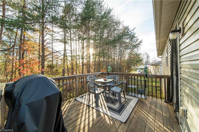 wooden terrace with grilling area