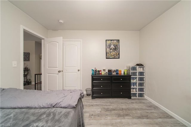 bedroom featuring light hardwood / wood-style floors