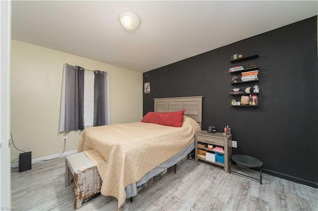 bedroom featuring light hardwood / wood-style flooring