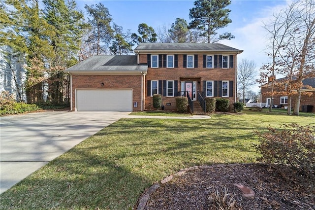 colonial inspired home with a garage and a front lawn