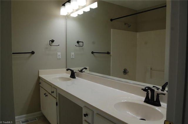 4711 Tuliptree Dr, Greensboro, NC 27455 - full bathroom featuring double vanity