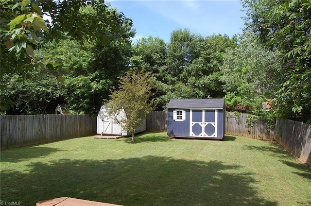 4711 Tuliptree Dr, Greensboro, NC 27455 - view of yard with a storage shed and an outdoor structure