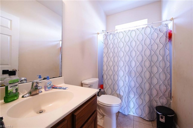 full bathroom featuring shower / bath combo with shower curtain, tile patterned flooring, vanity, and toilet