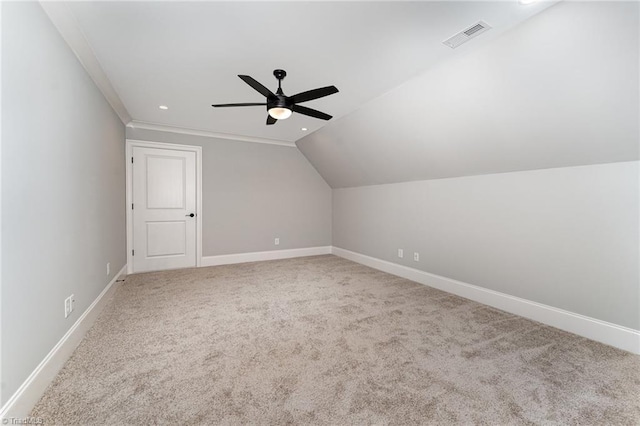 additional living space featuring lofted ceiling, carpet floors, and ceiling fan