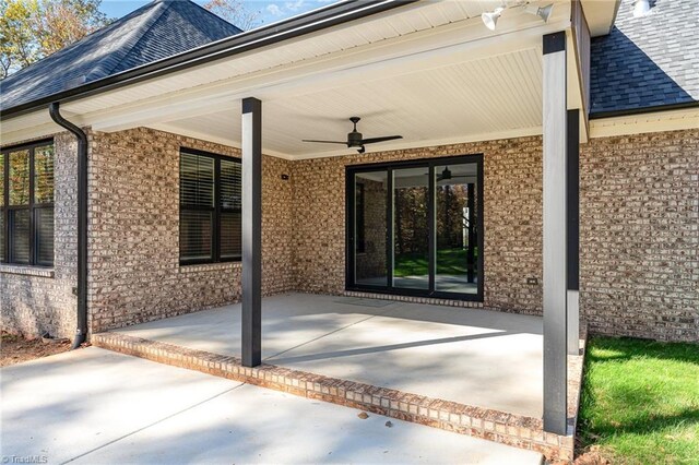 view of patio / terrace featuring ceiling fan