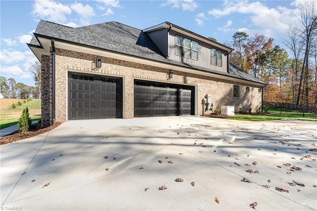 view of property exterior with a garage