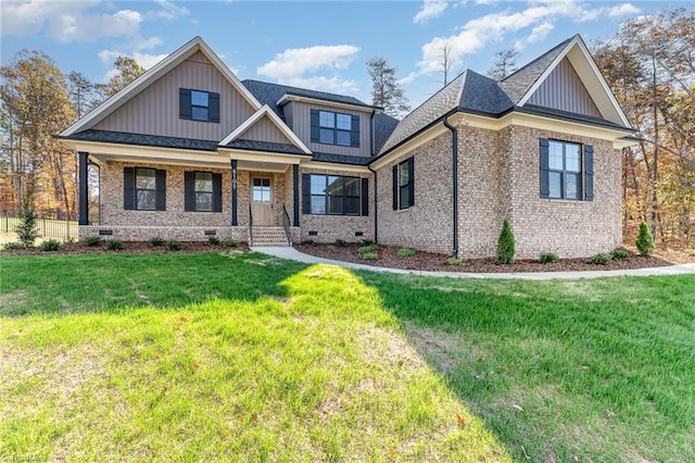 craftsman-style home with a porch and a front yard