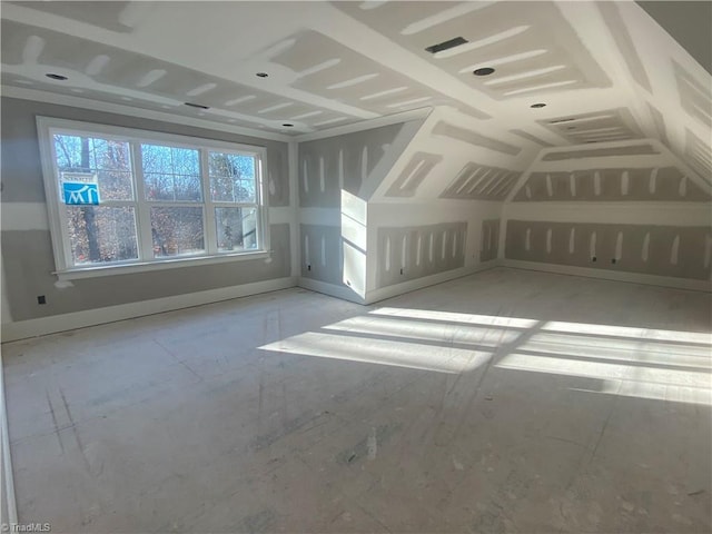 bonus room featuring lofted ceiling