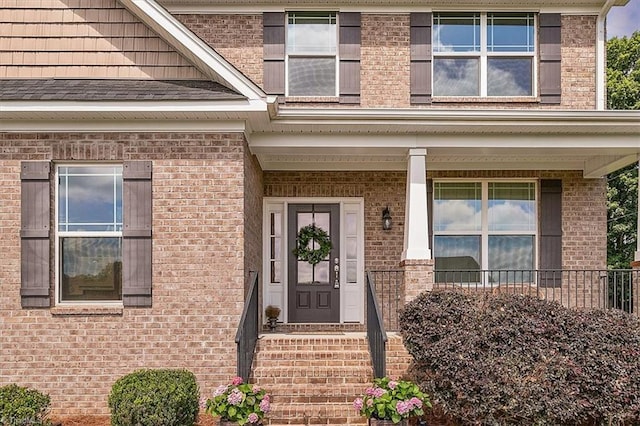 6605 Hedgerow Ct, Summerfield, NC 27358 - property entrance featuring brick siding