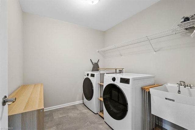 6605 Hedgerow Ct, Summerfield, NC 27358 - laundry area with washer and dryer and baseboards