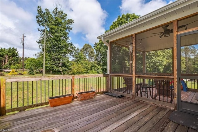 6605 Hedgerow Ct, Summerfield, NC 27358 - wooden deck with a yard, ceiling fan, and a sunroom
