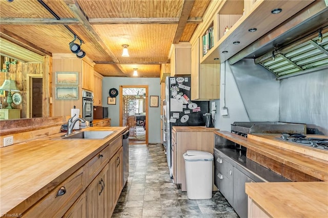 1215 Single Tree Rd, Westfield, NC 27016 - kitchen featuring butcher block countertops, appliances with stainless steel finishes, a sink, wooden ceiling, and custom exhaust hood