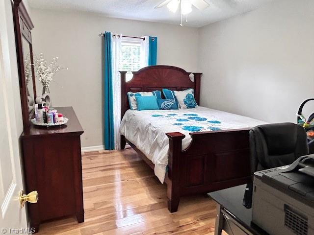 1320 Little Gate Dr, Asheboro, NC 27205 - bedroom with light wood-style floors and ceiling fan