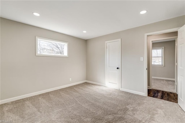 unfurnished bedroom with carpet, baseboards, and recessed lighting