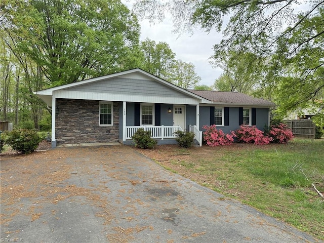 169 Pine View Rd, Eden, NC 27288 - single story home with a porch, driveway, stone siding, and fence