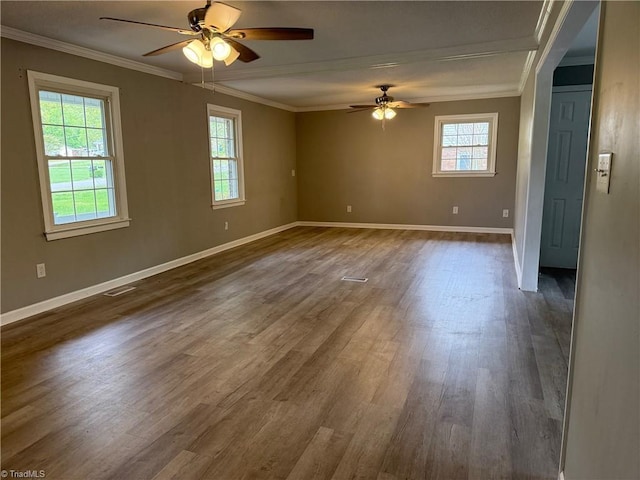 169 Pine View Rd, Eden, NC 27288 - spare room with dark wood-type flooring, ceiling fan, crown molding, and baseboards