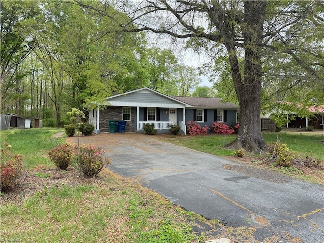 169 Pine View Rd, Eden, NC 27288 - ranch-style home with a front yard, driveway, stone siding, and covered porch