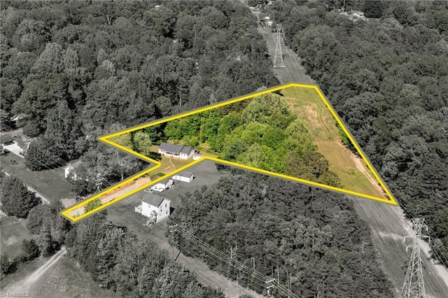 aerial view featuring a forest view