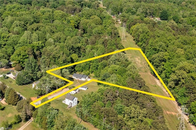 bird's eye view with a forest view