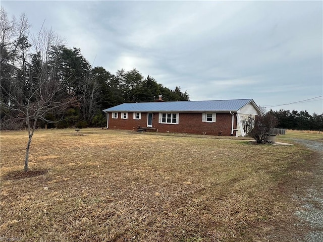 ranch-style home with a front yard