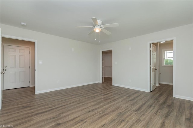 2075 Old Wesley Chapel Rd, Linwood, NC 27299 - empty room with wood finished floors, ceiling fan, baseboards, and a smoke detector