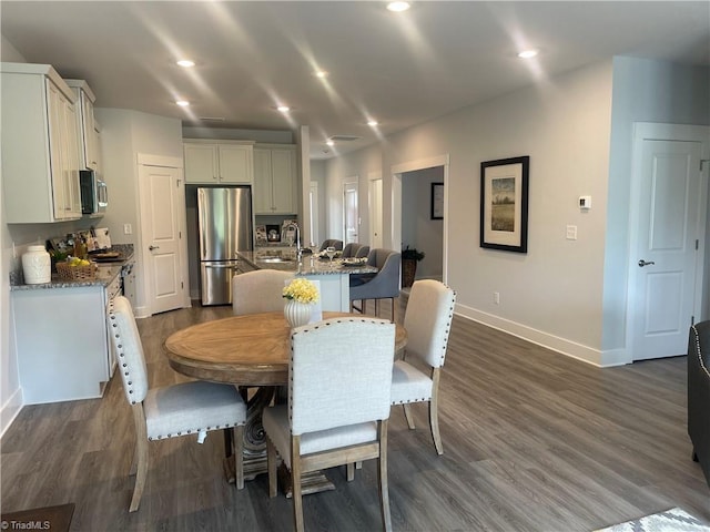 213 Cason Dr, Gibsonville, NC 27249 - dining area featuring baseboards, dark wood-style floors, and recessed lighting