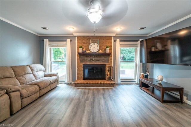 4905 Deer Pointe Ct, Greensboro, NC 27406 - living room featuring a wealth of natural light, wood finished floors, ceiling fan, and crown molding