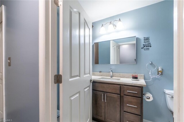 4905 Deer Pointe Ct, Greensboro, NC 27406 - half bathroom featuring toilet and vanity
