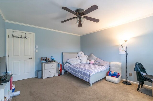 4905 Deer Pointe Ct, Greensboro, NC 27406 - carpeted bedroom with baseboards, crown molding, and ceiling fan